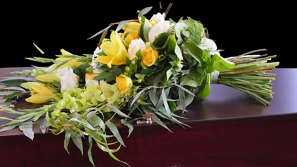 Yellow assortment casket presentation bouquet
