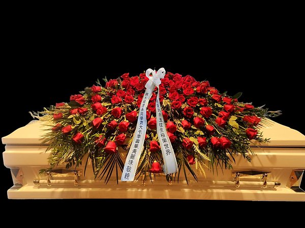 All red rose closed casket spray