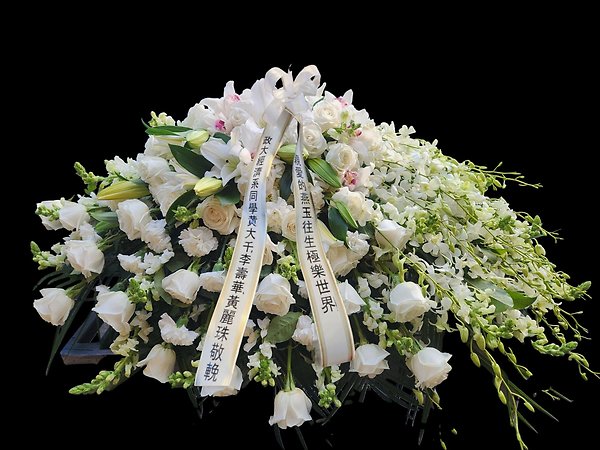 Premium all white assortment casket spray