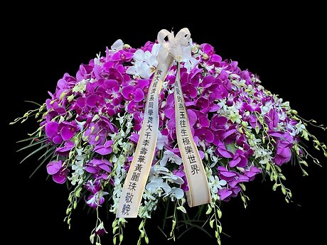 Orchid assortment casket spray
