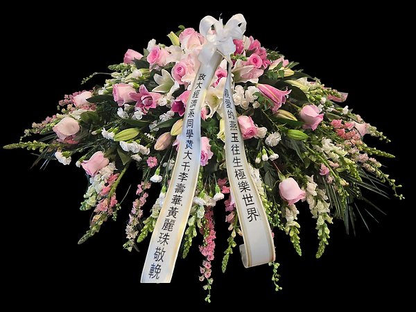Pink and white casket spray