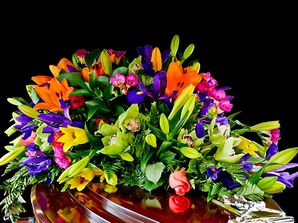 Glowing garden casket spray