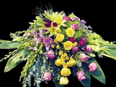 Mauve Sunshine Casket Spray